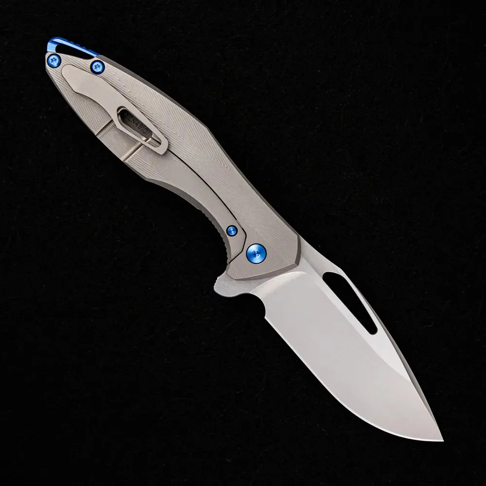 ARIUS – PATTERNED TITANIUM HANDLE – BLUE HARDWARE – BURNISHED W/ POLISHED FLATS 20CV BLADE