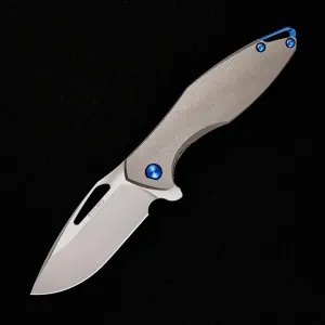 ARIUS – PATTERNED TITANIUM HANDLE – BLUE HARDWARE – BURNISHED W/ POLISHED FLATS 20CV BLADE